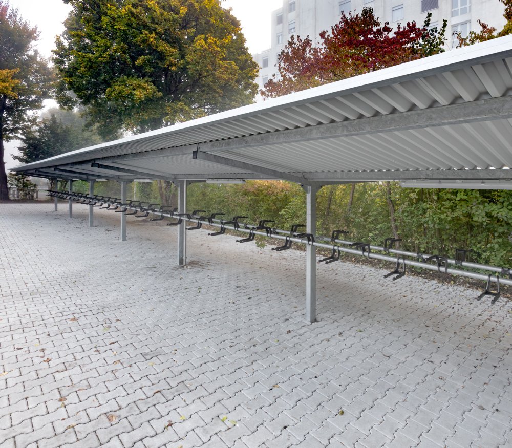 Überdachung Gottardo zweiseitig mit Fahrradparkiersystem mit Lenkerhalterung